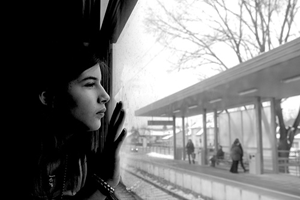 Pensively taking it all in from the train window